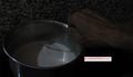 Cooking bowl on fire & contents continuously stirred to avoid solidification & uneven cooking.
