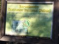 stormwater pond information posted next to water