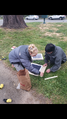 Annabel and Fiona working on the solar panel flaps that will be connected to the rest of the box using hinges