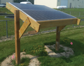 Solar photovoltaic wood racking mechanical design for trellis-based agrivoltaics