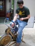 Garrett testing the voltage output for a bike generator.