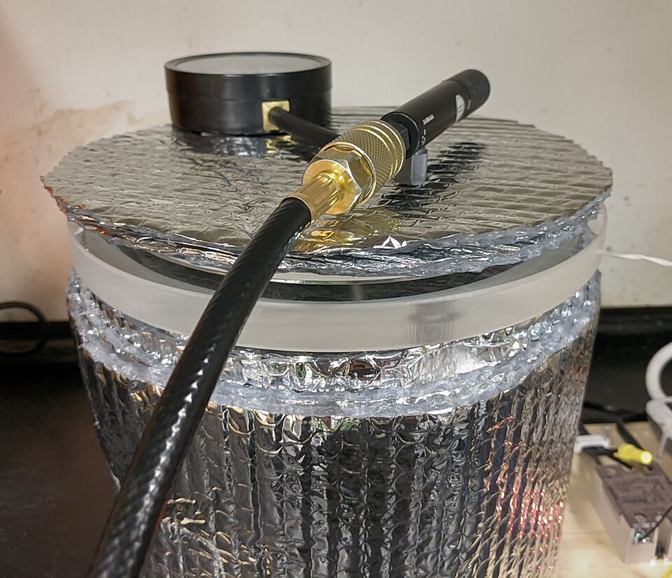 File:MOST PlaceLidOnVacuumChamber.jpg