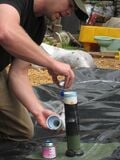 IRRI President and Biobolsa designer Alex glues PVC to the intake pipe
