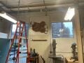 Cardboard prototype on wall.