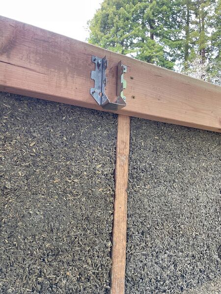 File:Roof beam metal brace.jpg