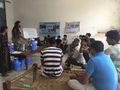 Holding workshop on safe water storage construction
