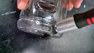 If using a small knife, firmly pressing it into the bottom edge is a good method. If force is applied near the line, the flashing, it may be easier.