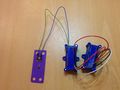 Printed boltable strain gage with neural network calibration