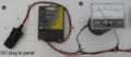 Fig 4: Close-up of the DC outlet to the PV panel, the charge controller, and the voltage meter.