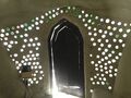 The plastic water bottles create a stunning view on the inside of the earthship.