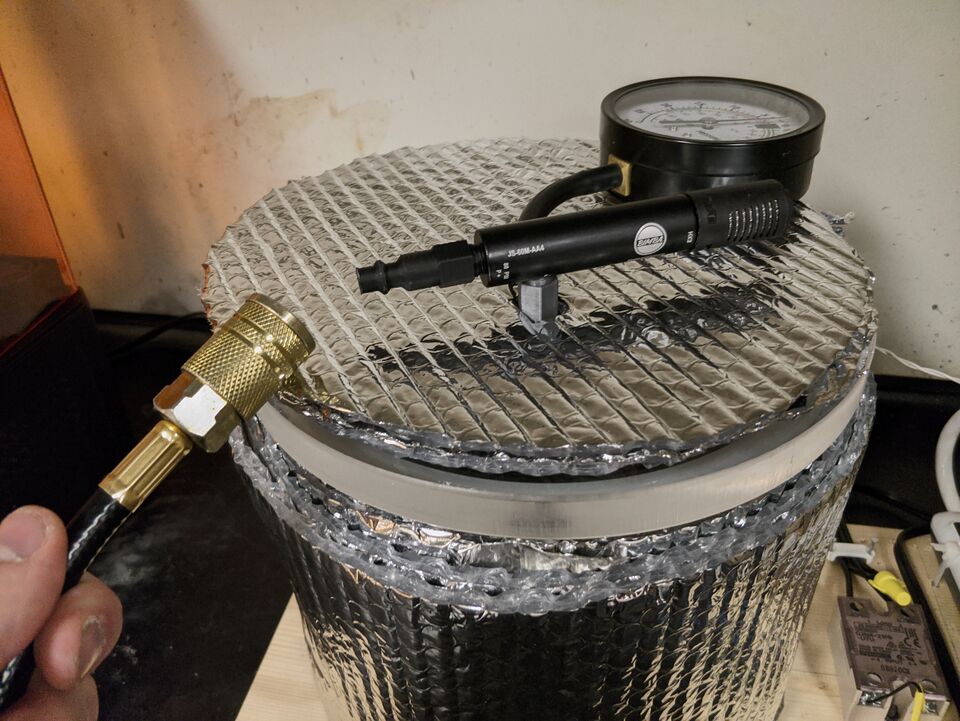 File:MOST AboutToConnectHoseToVacuumPump.jpg