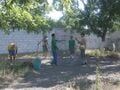 Fig 2: To clear and level the area tools such as hoes, shovels, rakes, and pick axes were used.