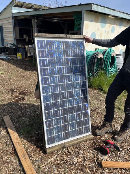 File:Solar panel frame in building process.jpg