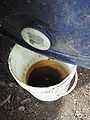 Fig 3:A bucket to catch worm tea from a small drilled hole