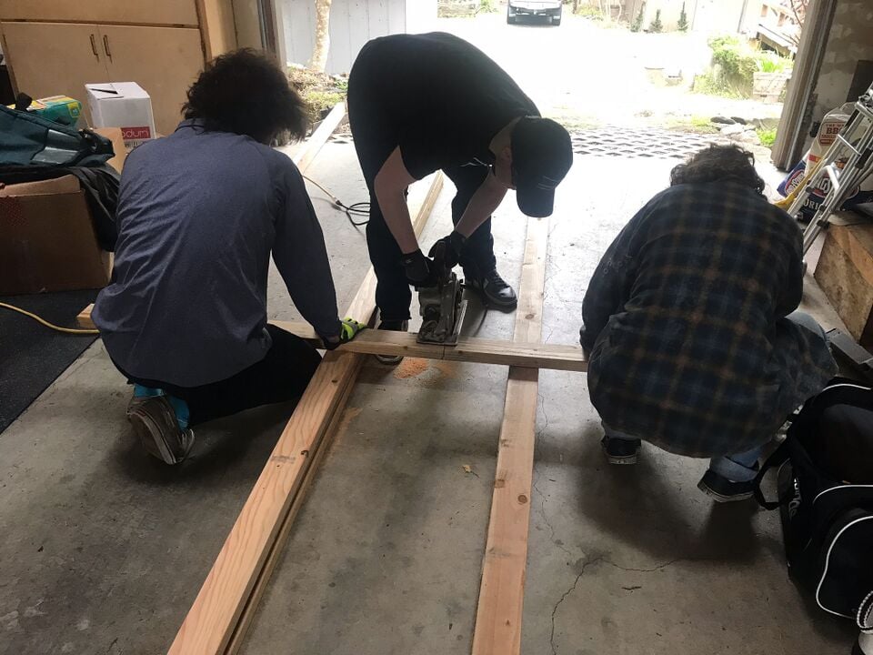 File:Framed Four CuttingWood.jpg