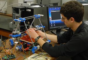 300px-Brennan_fixing_a_reprap.JPG