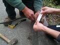 Fixing on of the pneumatic tubes that broke.
