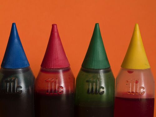 Red food colouring bottles