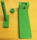 Main support bar, screw and a nut.