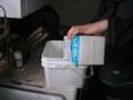 Pour milk into container