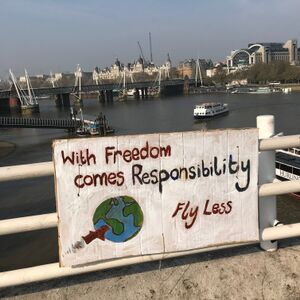 Mit Freiheit kommt Verantwortung.  Fly less cropped(46933214734).jpg