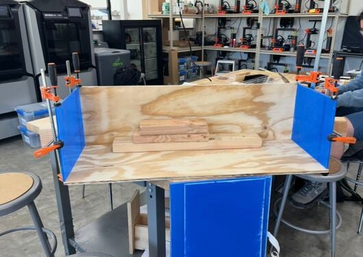 Tsunami tank sides getting glued with resin.