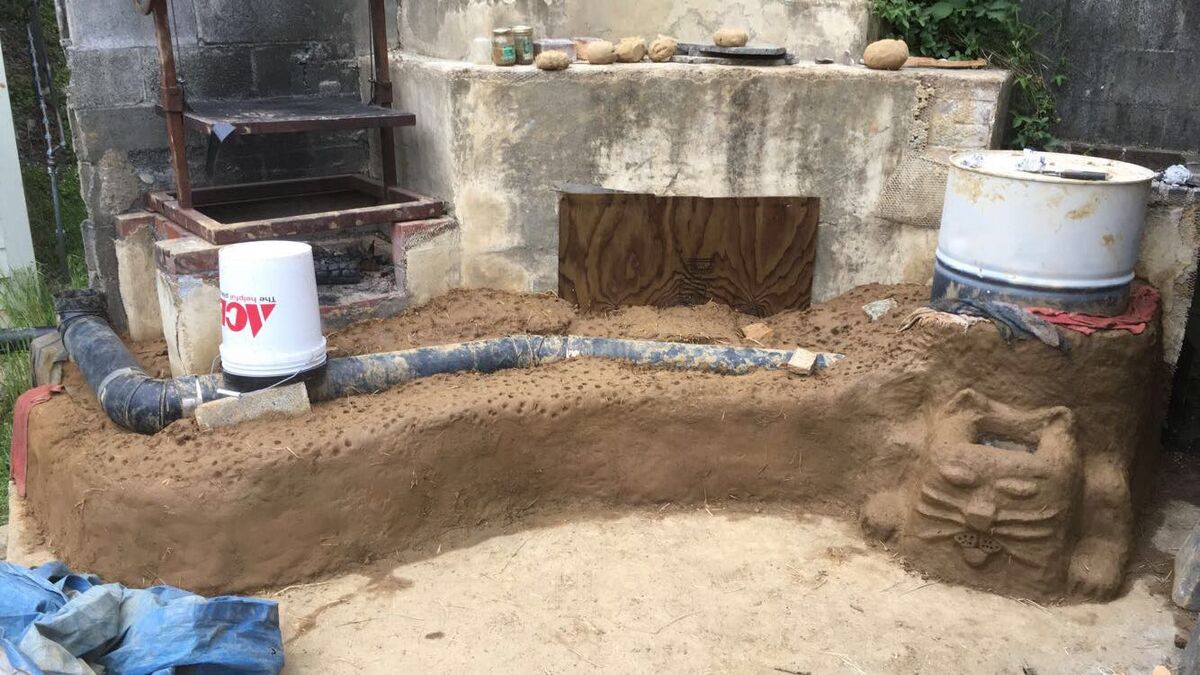 CCAT rocket mass cobb bench heater