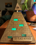 "Brick" side with title card and green light shining through