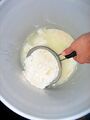 Scoop curds out with strainer or slotted spoon